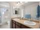 Double vanity bathroom with a shower at 1021 Neptunite Pl, Castle Rock, CO 80108