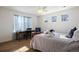 Bedroom with a desk and large window at 1021 Neptunite Pl, Castle Rock, CO 80108