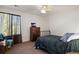 Cozy bedroom with natural light, comfortable carpet and simple decor, a great place to relax and recharge at 1021 Neptunite Pl, Castle Rock, CO 80108