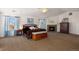 Main bedroom with fireplace, large windows, and ample space at 1021 Neptunite Pl, Castle Rock, CO 80108