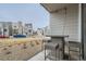Outdoor patio with table and chairs, showcasing the neighborhood at 12345 Festival Ln, Thornton, CO 80241