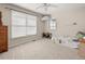 Cozy bedroom with ample natural light, plush carpeting, and a ceiling fan to keep you cool at 10631 Clarke Farms Dr, Parker, CO 80134