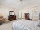 Spacious bedroom featuring a vaulted ceiling, carpeted floor, and ample storage at 10631 Clarke Farms Dr, Parker, CO 80134
