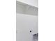 Well-lit laundry room featuring a folding shelf and power outlets at 27574 E Byers Ave, Aurora, CO 80018
