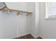 Walk-in closet features ample storage space with rods and shelving at 2036 S Vance Way, Lakewood, CO 80227