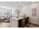 Open-concept layout connecting the kitchen and living room, great for gatherings and everyday living at 2036 S Vance Way, Lakewood, CO 80227