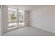 Bright bedroom with carpet, large windows, and neutral color palette at 11468 Alla Breve Cir, Lone Tree, CO 80134