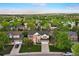 Aerial view of a two-story home featuring a landscaped front yard and a manicured lawn at 9810 Townsville Cir, Highlands Ranch, CO 80130