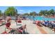 Community pool with umbrellas, lounge chairs, and plenty of space for residents to relax and enjoy the outdoors at 23070 York Ave, Parker, CO 80138