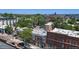 An aerial view displays the building's roofline with the city visible in the background at 2944 Zuni St # B, Denver, CO 80211