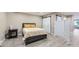 Comfortable bedroom with sliding barn doors for extra closet space, and neutral tones at 2944 Zuni St # B, Denver, CO 80211