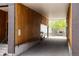 Covered driveway providing convenient parking, showcasing architectural details and easy access to the property at 3233 Tejon St # 103, Denver, CO 80211