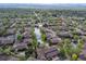 Aerial view of a community with ponds and trees in a park-like setting at 2800 S University Blvd # 170, Denver, CO 80210
