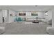 Spacious basement with wall-to-wall carpet, a couch, and a small table and chairs at 2800 S University Blvd # 170, Denver, CO 80210