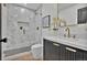 Bathroom with tile walk-in shower and modern vanity with a white countertop at 2800 S University Blvd # 170, Denver, CO 80210