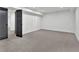 Well-lit carpeted bedroom with black doors and recessed lighting, creating a clean and modern aesthetic at 2800 S University Blvd # 170, Denver, CO 80210