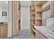 Spacious walk-in closet with lots of built-in shelves for storage at 2800 S University Blvd # 170, Denver, CO 80210