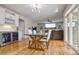 Open concept dining area connects to the living room and kitchen, great for entertaining at 10824 Quail Ridge Dr, Parker, CO 80138