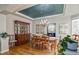 Formal dining room with hardwood floors, a china cabinet, and a chandelier at 10824 Quail Ridge Dr, Parker, CO 80138