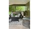 Covered outdoor patio featuring comfortable seating and stylish decor at 10824 Quail Ridge Dr, Parker, CO 80138