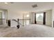 Bright and airy loft space featuring neutral walls, plush carpeting and a window with lovely backyard views at 282 Vialpando St, Brighton, CO 80601