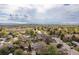 Expansive aerial view of neighborhood showcasing tree-lined streets and beautiful mountain views at 7286 Wolff St, Westminster, CO 80030