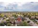 Panoramic view of the home and neighborhood with lush greenery and mountain views in the distance at 7286 Wolff St, Westminster, CO 80030