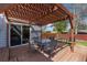 Charming outdoor patio area with a wooden pergola and dining set for entertaining at 7286 Wolff St, Westminster, CO 80030