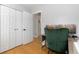 Bright bedroom with a spacious closet, desk, and monitor at 7286 Wolff St, Westminster, CO 80030