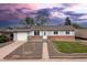 Charming single-story home with a well-maintained front yard and solar panels at 7286 Wolff St, Westminster, CO 80030