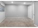 Neutral basement bedroom with closet and window at 17698 E Loyola Dr # E, Aurora, CO 80013