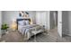 Inviting bedroom with a comfortable bed and stylish decor at 17698 E Loyola Dr # E, Aurora, CO 80013