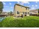 Spacious backyard with well-maintained lawn, featuring a grill and outdoor dining area at 10530 Mount Columbia Pl, Parker, CO 80138