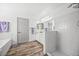 Modern bathroom with double shower, white cabinets and elegant finishes at 10530 Mount Columbia Pl, Parker, CO 80138
