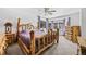 Bedroom featuring a rustic-style bed frame and furnishings plus plenty of natural light at 10530 Mount Columbia Pl, Parker, CO 80138