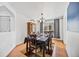 Inviting dining room with wood floors and elegant furnishings for a comfortable dining experience at 10530 Mount Columbia Pl, Parker, CO 80138
