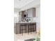 Contemporary kitchen featuring a breakfast bar with stool seating and stainless steel appliances at 4485 Tennyson St # 5, Denver, CO 80212