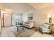 Cozy living room featuring a comfortable sofa, large windows, and stylish decor at 5260 Garrison St # 11, Arvada, CO 80002