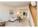 Inviting living room with carpet, a modern area rug, and stairway access at 5260 Garrison St # 11, Arvada, CO 80002