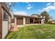Large grassy backyard features a patio area, garage and shed at 10550 Routt St, Westminster, CO 80021