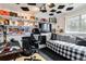 Creative bedroom design with music-themed decor, a cozy bed, and a functional workspace at 10550 Routt St, Westminster, CO 80021