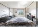 Bedroom features four poster bed and dresser with TV at 10550 Routt St, Westminster, CO 80021