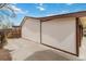 Driveway leads to an attached garage and fenced in area at 10550 Routt St, Westminster, CO 80021