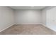 Spacious bedroom featuring neutral paint, plush carpeting, and ample closet space at 6450 W 44Th Pl # B3, Wheat Ridge, CO 80033