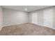 Spacious bedroom featuring neutral paint, plush carpeting, and ample closet space at 6450 W 44Th Pl # B3, Wheat Ridge, CO 80033