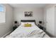 Cozy bedroom features sleek furniture and neutral colors at 6450 W 44Th Pl # B3, Wheat Ridge, CO 80033