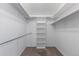 Walk-in closet has shelves and clothes racks at 6450 W 44Th Pl # B3, Wheat Ridge, CO 80033