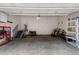 Organized two-car garage with ample space for vehicles, tools, and storage solutions at 6450 W 44Th Pl # B3, Wheat Ridge, CO 80033