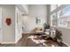 Cozy living room with large windows and comfortable seating at 6450 W 44Th Pl # B3, Wheat Ridge, CO 80033