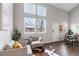 Bright living room featuring comfortable seating, natural light, and stylish decor at 6450 W 44Th Pl # B3, Wheat Ridge, CO 80033